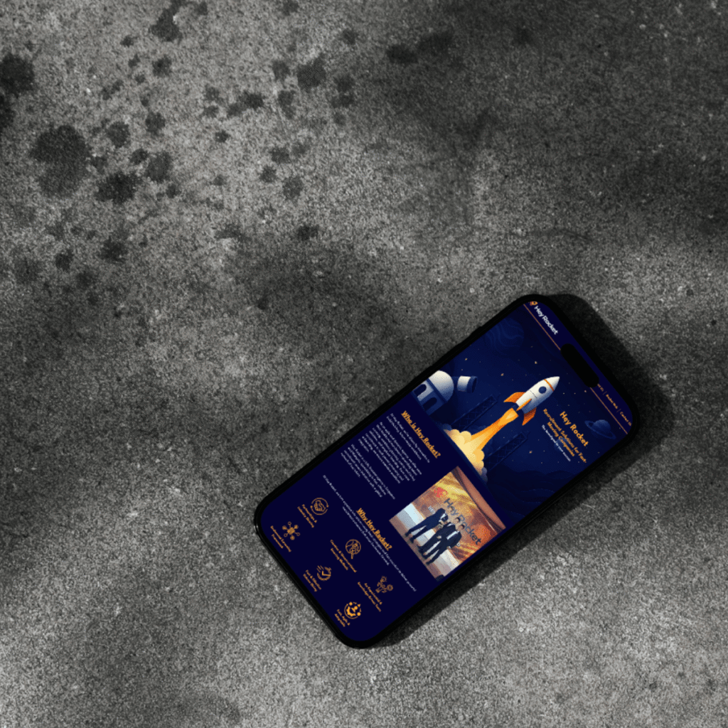 Full-page view of Hey Rocket’s mobile website on a vertical smartphone, highlighting company intro, service icons, and a rocket-themed hero image.