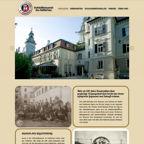 Homepage of Schlossbrauerei Au-Hallertau featuring a historic photo carousel and insights into over 400 years of brewing legacy.